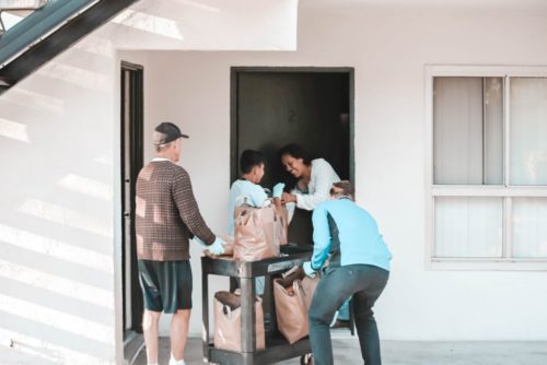 People delivering food to homes